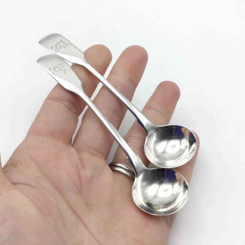 Silver condiment spoons